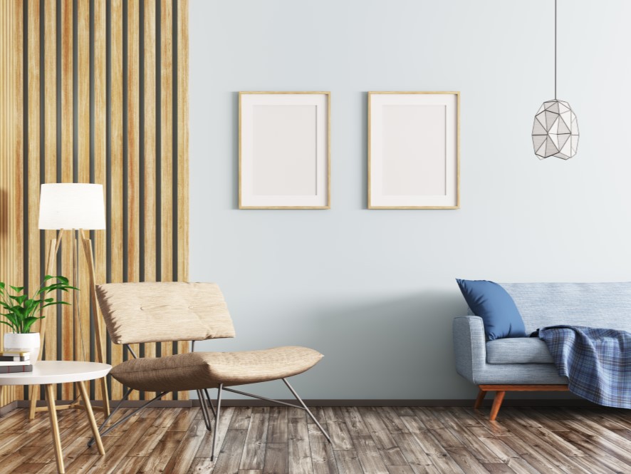 Serene_Entry_way_blue_feature_wall_wooden_striped_wall_blue_couch_pillow_throw_white_table