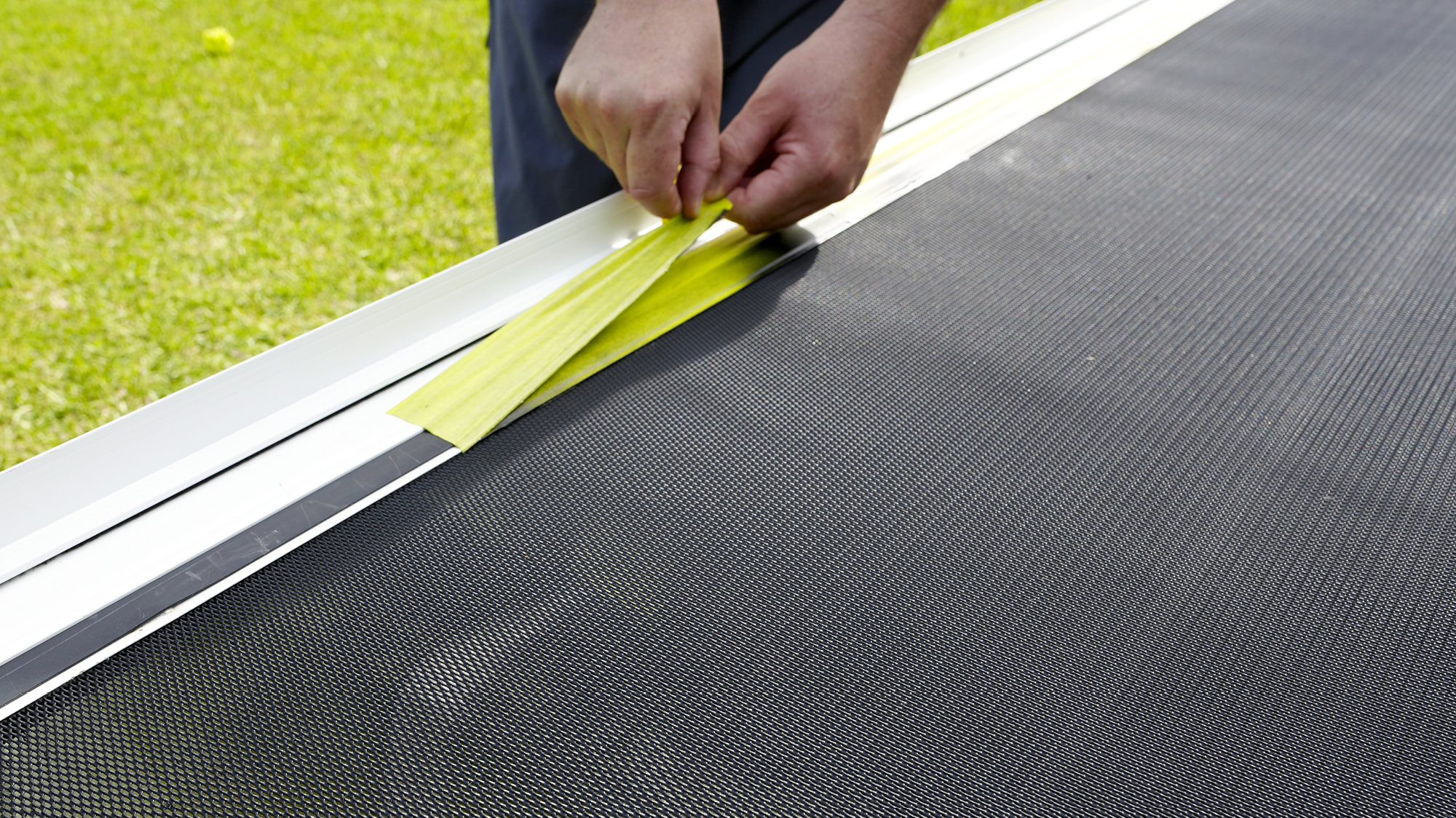 Removing painter'stape from screen door