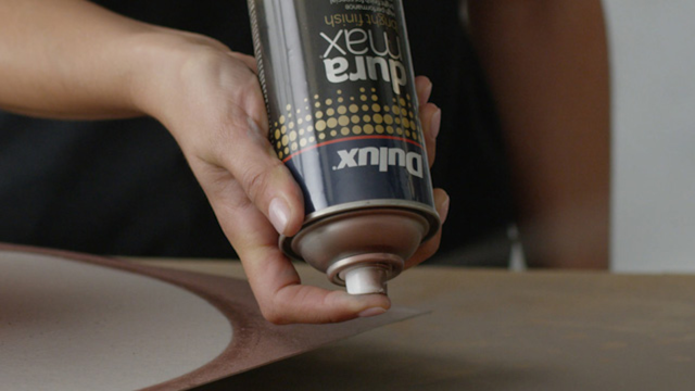 Upside down spray can